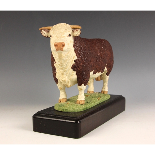 452 - A Shebeg Isle Of Man studio pottery model of a Hereford bull by John Harper, matt glazed, modelled s... 