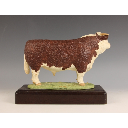 452 - A Shebeg Isle Of Man studio pottery model of a Hereford bull by John Harper, matt glazed, modelled s... 