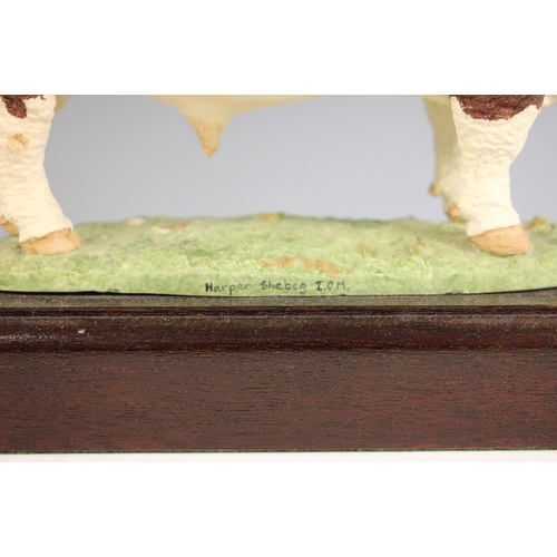 452 - A Shebeg Isle Of Man studio pottery model of a Hereford bull by John Harper, matt glazed, modelled s... 