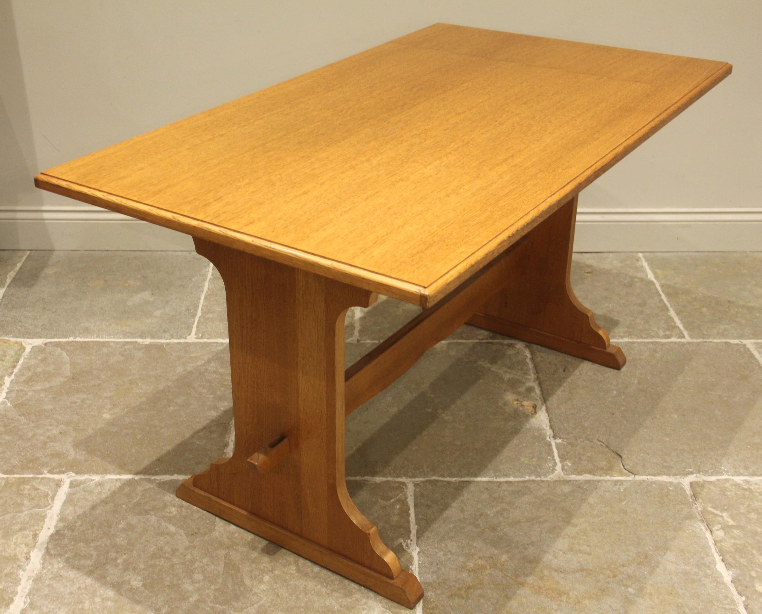 An oak refectory table, late 20th century, the moulded rectangular top ...