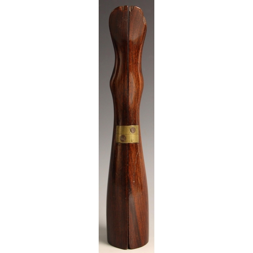 A Victorian rosewood-cased boot pull set, 19th century, the carved tall ...