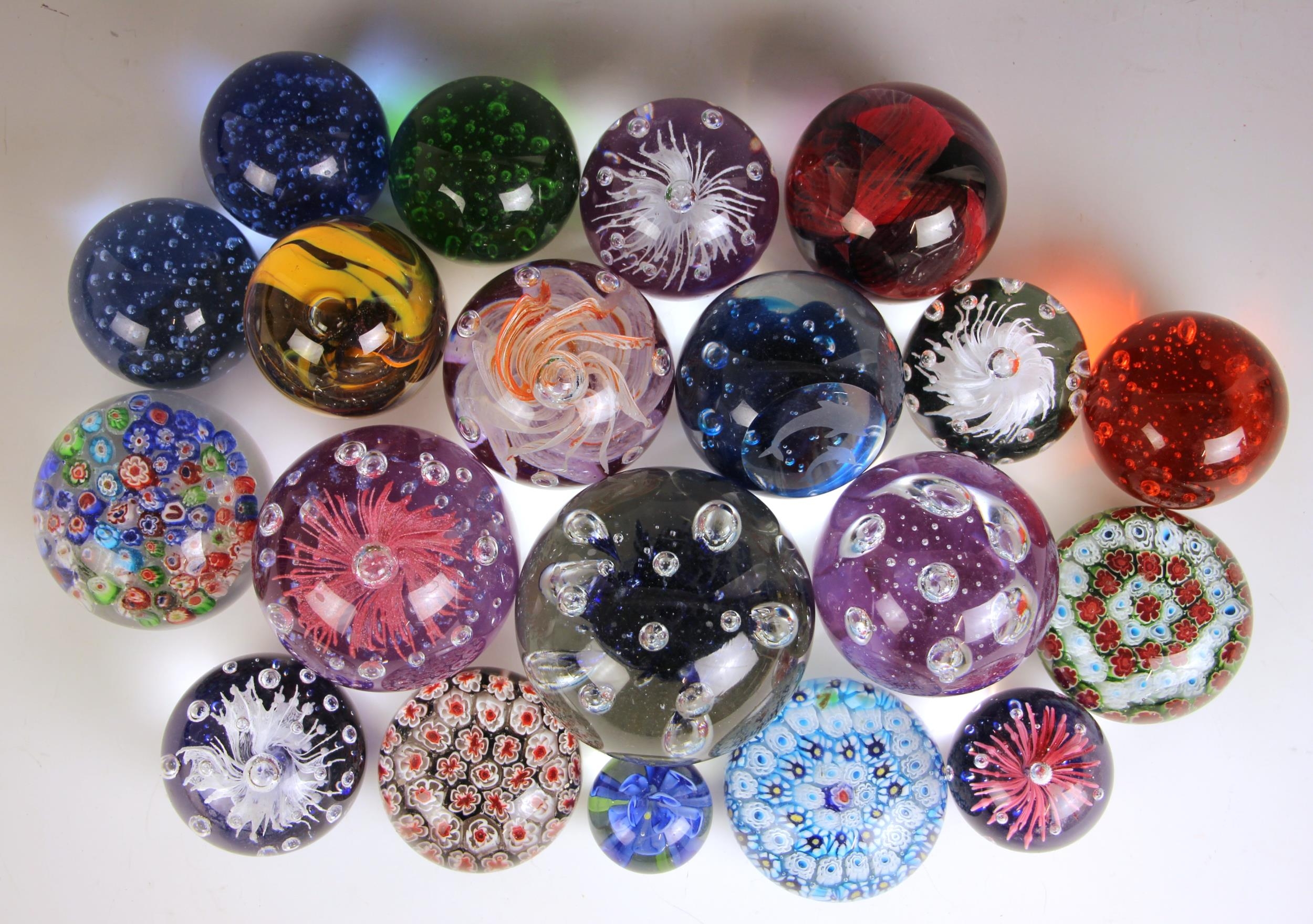Twenty one glass paperweights by Caithness and others, 20th century and ...