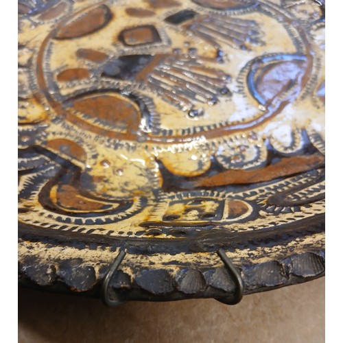 A Staffordshire Toft ware style slip painted earthenware bowl in the ...