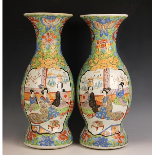 592 - A pair of Japanese porcelain vases, Meiji Period (1868-1912), each baluster shaped vase decorated ag... 