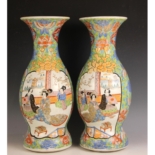 592 - A pair of Japanese porcelain vases, Meiji Period (1868-1912), each baluster shaped vase decorated ag... 