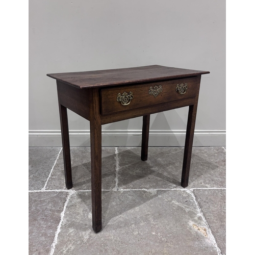 A George III oak lowboy, the rectangular top above a single frieze ...