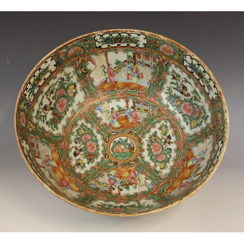 593 - A Chinese porcelain famille rose centre bowl, late 19th century, the large circular bowl decorated w... 