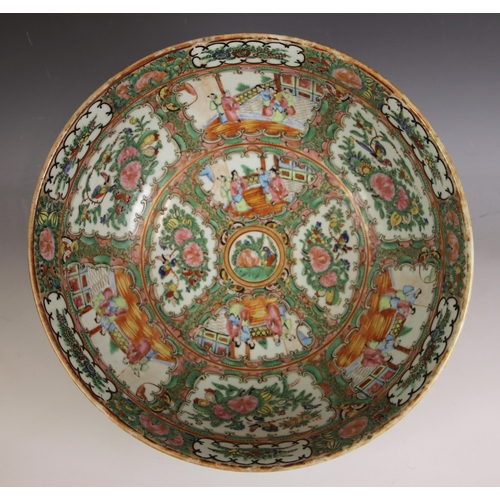 593 - A Chinese porcelain famille rose centre bowl, late 19th century, the large circular bowl decorated w... 