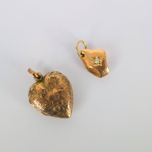 100 - A late 20th century 9ct gold pendant, the organically shaped pendant set with diamond, hallmarked to... 