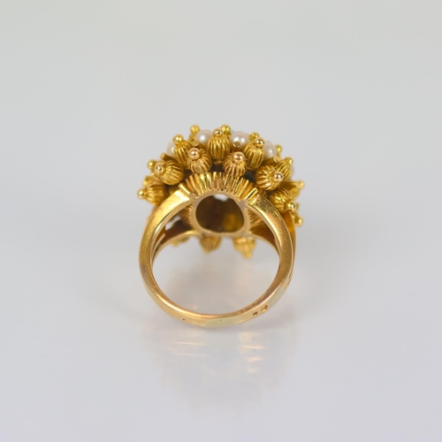 114 - A late 20th century turquoise and cultured pearl cocktail ring, possibly Portuguese, the large bombe... 