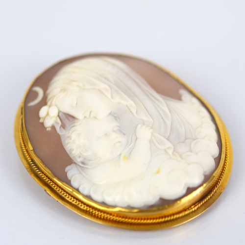 115 - A 19th century Italian cameo brooch, the central oval depiction of the Madonna with child, within a ... 