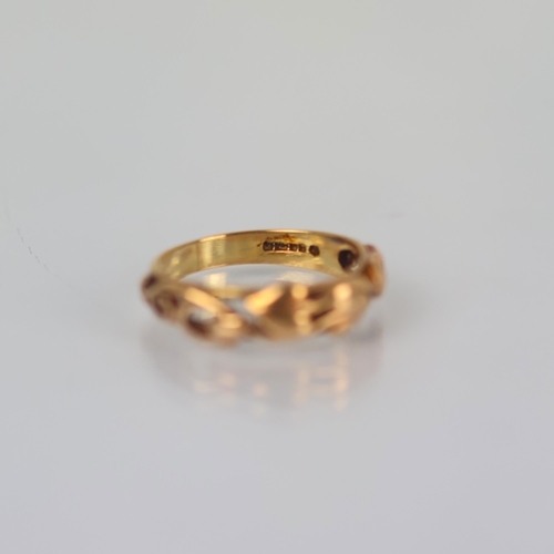 119 - A late 20th century 9ct gold Clogau 'Tree of Life' ring, of typical openwork form with organic leaf ... 