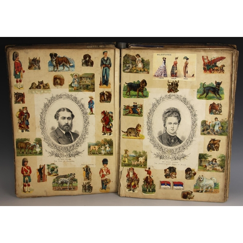 385 - A scrapbook of large proportions, early 20th century, to include a pasted down Louis Wain postcard, ... 
