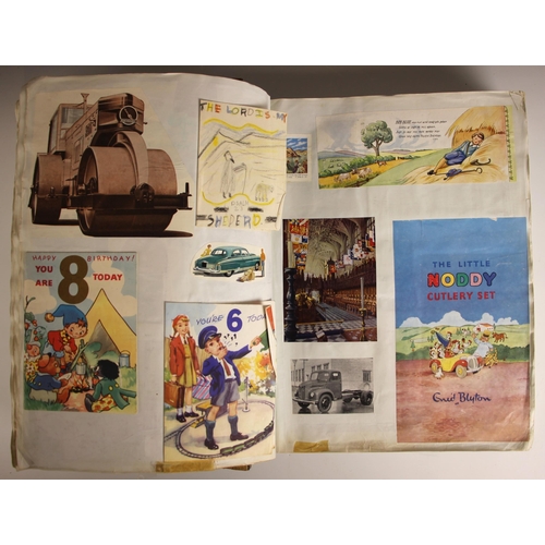 385 - A scrapbook of large proportions, early 20th century, to include a pasted down Louis Wain postcard, ... 