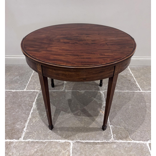 550 - A Regency mahogany and satinwood inlaid demi-lune tea table, the fold-over top raised on four legs o... 