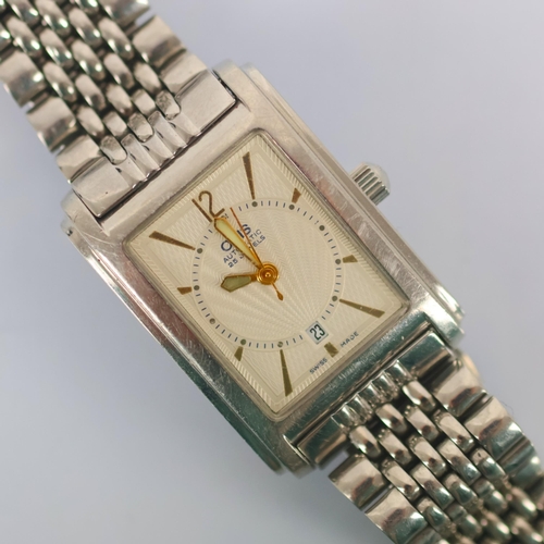 84 - A ladies Oris automatic wristwatch, the rectangular dial with baton and Arabic numerals, date apertu... 