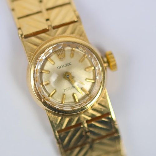 85 - A ladies 9ct gold Rolex Precision wristwatch, the circular silver coloured dial with baton markers, ... 