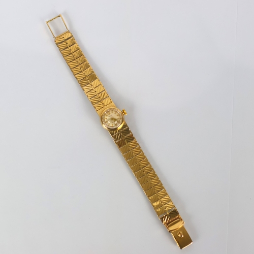 85 - A ladies 9ct gold Rolex Precision wristwatch, the circular silver coloured dial with baton markers, ... 