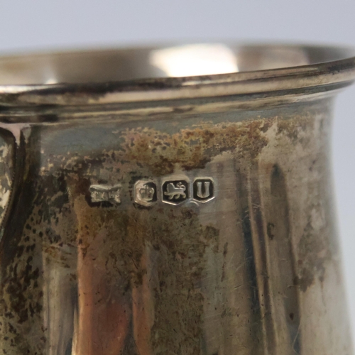 26 - A mid 20th century silver christening mug, Walker & Hall, Sheffield 1962, the flared rim above cylin... 