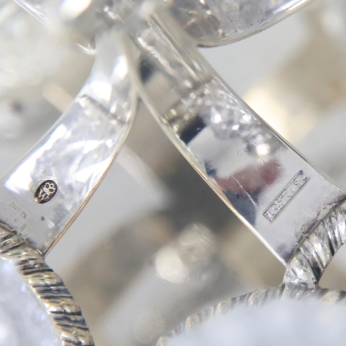 31 - A George III silver cruet stand, John and Thomas Settle, Sheffield 1814, the shaped handle with gadr... 