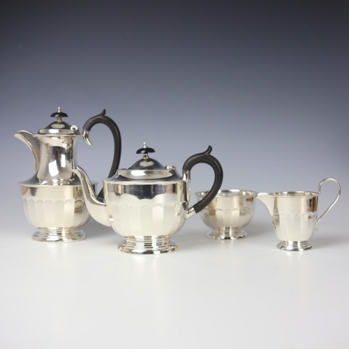 32 - A near matched George V silver four piece tea service, Viner's Ltd, Sheffield 1932/33, comprising te... 