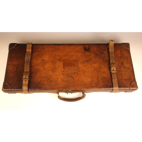 394 - A shotgun case by Charles Lancaster of London, 19th century, the wooden framed leather bound case wi... 