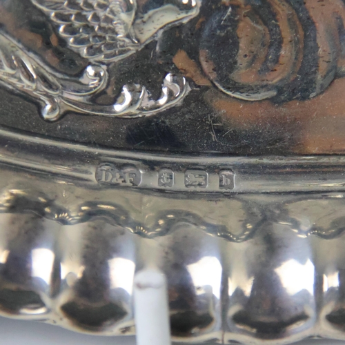 45 - An Edwardian silver dressing table tray, Deakin & Francis Ltd, Birmingham 1901, of oval form with cr... 