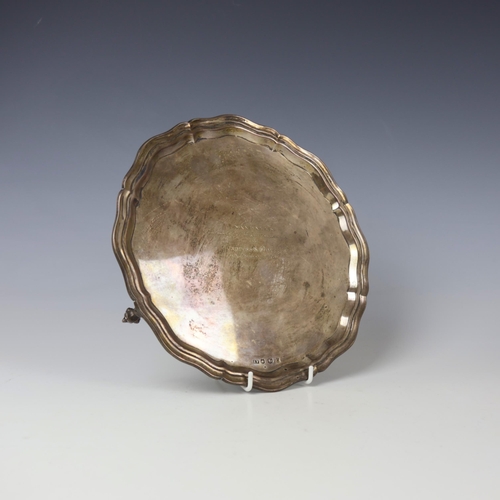 5 - A mid 20th century silver salver, Viner's Ltd, Sheffield 1958, the shaped rim above presentation eng... 