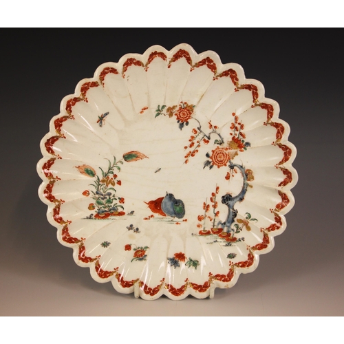 303 - A Bow porcelain kakiemon palette chrysanthemum shaped dish in the 'Two Quail' pattern, mid 18th cent... 