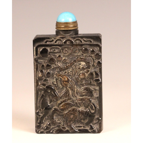 326 - A Chinese carved horn snuff bottle, early 20th century, of rectangular form and carved with deer (Lu... 