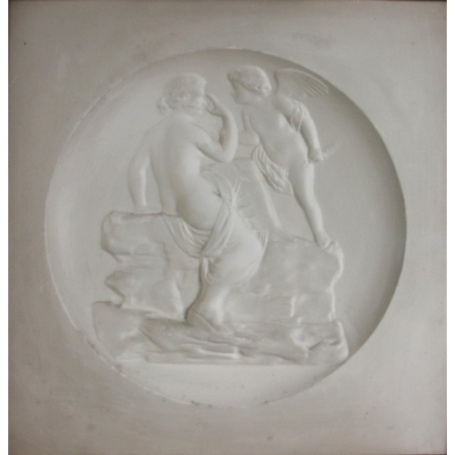 378 - A relief moulded plaster tondo panel depicting Venus and Cupid in the antique manner, framed and gla... 