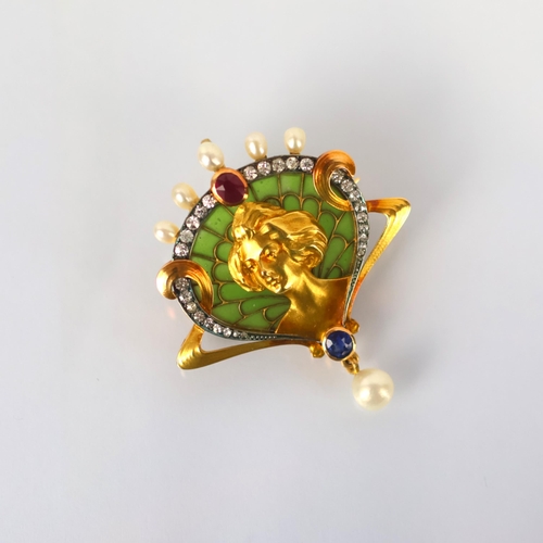 104 - An early 20th century French brooch/pendant, the Art Nouveau brooch with central depiction of maiden... 