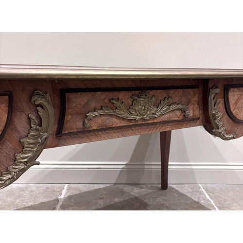 549 - A French Louis XVI kingwood and tulipwood ormolu mounted bureau plat, the top of rectangular form bo... 