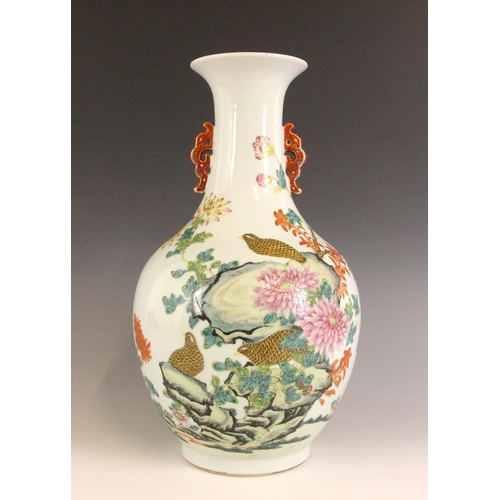 331 - A Chinese porcelain famille rose vase, Daoguang character mark, the begonia shaped vase with two ruy... 