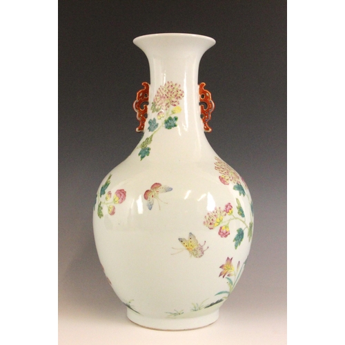 331 - A Chinese porcelain famille rose vase, Daoguang character mark, the begonia shaped vase with two ruy... 