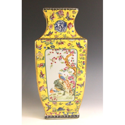 337 - A Chinese famille jaune vase, Qianlong four-character mark, the vase of baluster square section deco... 