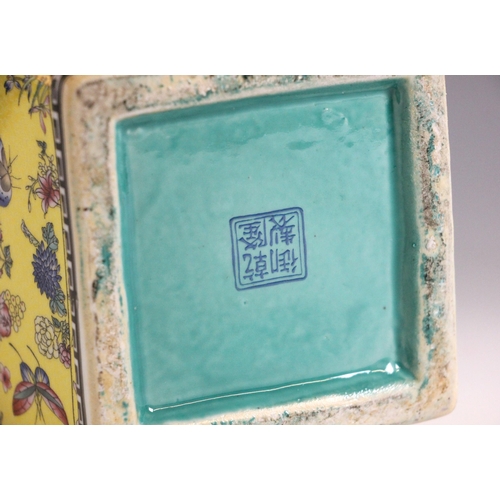 337 - A Chinese famille jaune vase, Qianlong four-character mark, the vase of baluster square section deco... 