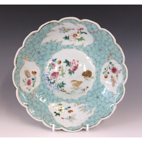 338 - A Chinese porcelain turquoise ground bowl, 18th century, the bowl of circular form with lobed rim an... 