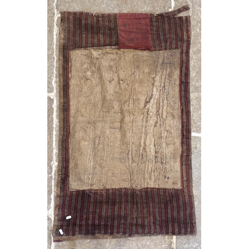 415 - A South East Asian Tibetan Thangka, 19th century, painted in gouache against a silk and metallic gro... 