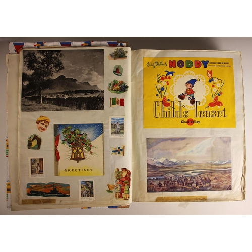 385 - A scrapbook of large proportions, early 20th century, to include a pasted down Louis Wain postcard, ... 