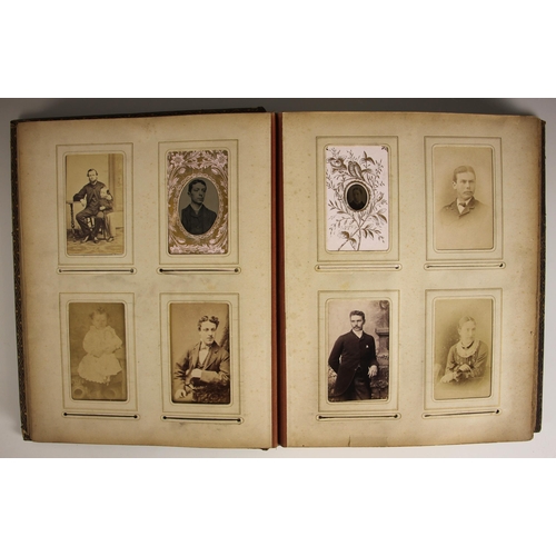 385 - A scrapbook of large proportions, early 20th century, to include a pasted down Louis Wain postcard, ... 