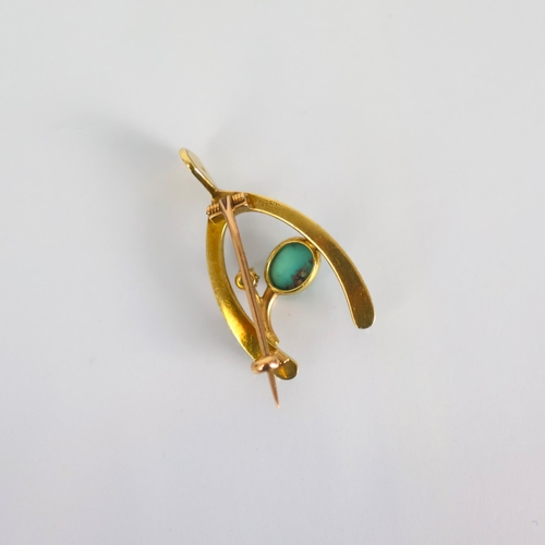 111 - A 19th century diamond and turquoise brooch, the seed pearl set wishbone designed brooch set with ol... 