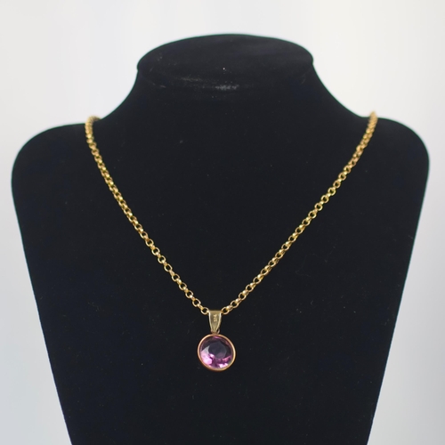 122 - An early 20th century yellow metal chain, the trace link chain with applied '9c' pad and associated ... 