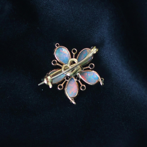 127 - A 19th century opal and diamond brooch/pendant, the five pear shaped cabochon opals set with old cut... 