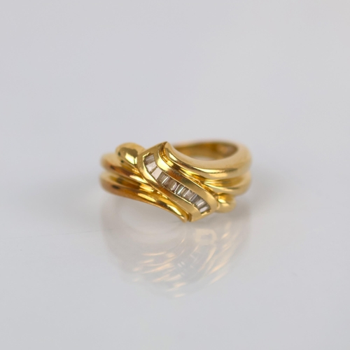 134 - A late 20th century diamond dress ring, the organically shaped head encompassing a row of channel se... 