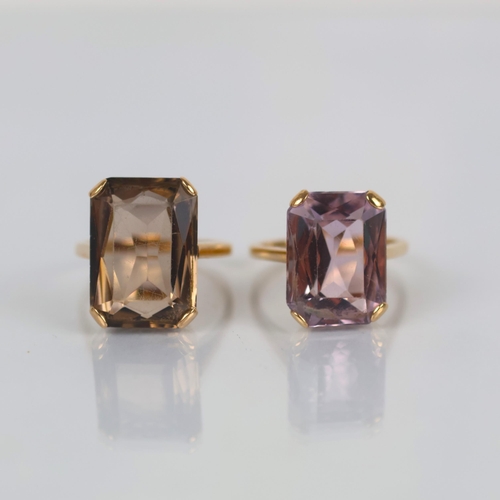 146 - A late 20th century 9ct gold amethyst ring, the cocktail style ring with central emerald cut amethys... 