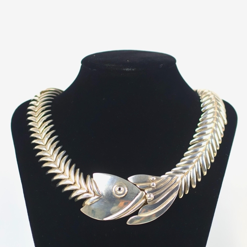 147 - A late 20th century Mexican silver necklace, by D'Molina, the stylised fish necklace with scale shap... 