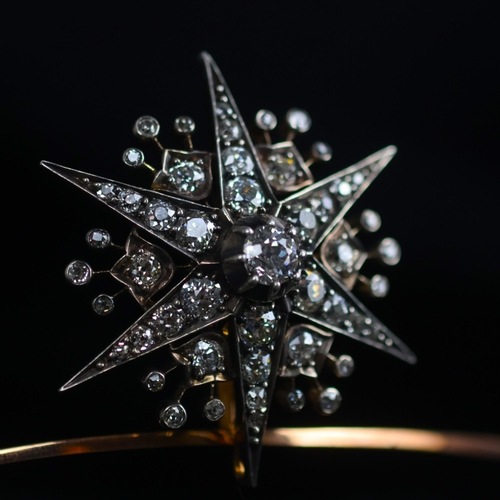 150 - A 19th century trio of diamond brooches converting to a tiara, hair combs and /or pendants, the thre... 