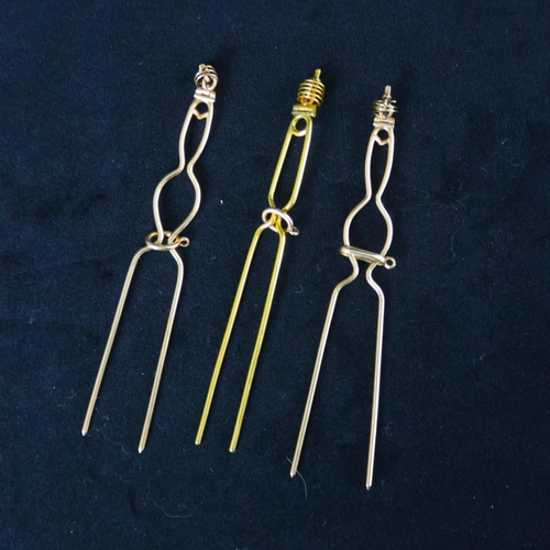 150 - A 19th century trio of diamond brooches converting to a tiara, hair combs and /or pendants, the thre... 