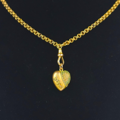 168 - An early 20th century yellow metal chain, the double style trace link chain with applied '15' pad an... 